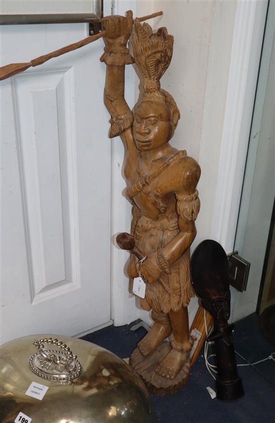 A large carved wood figure of a native American and an African tribal wood figure tallest 93cm